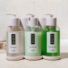 White Refillable DLUX Dispenser for Shower